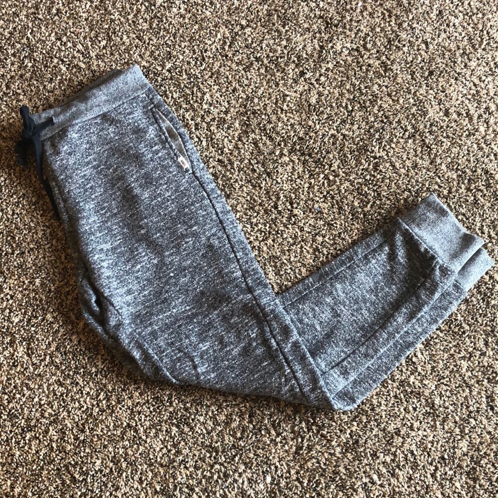 Gray Vans joggers.